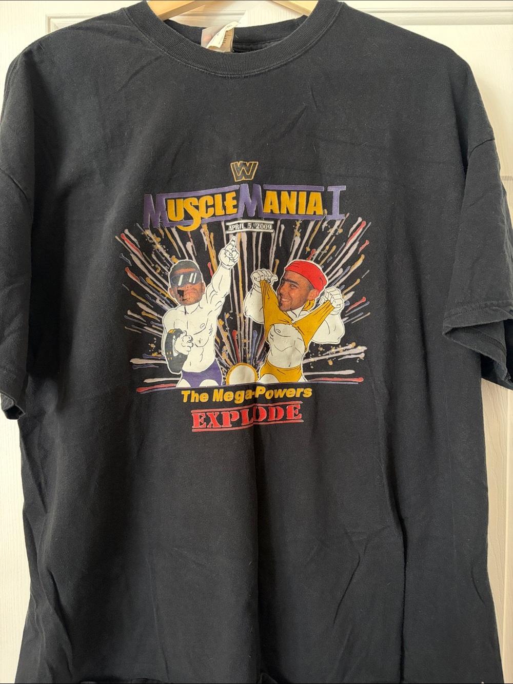 Black MuscleMania Mega-Powers Graphic Short Sleeve Tee